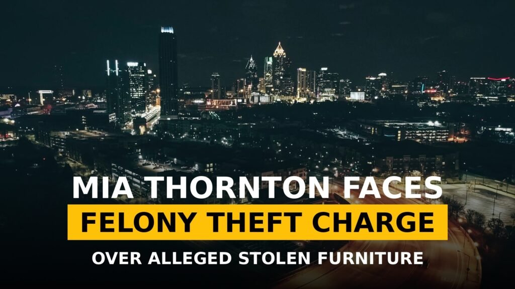 Mia Thornton felony theft furniture case — Atlanta skyline at night