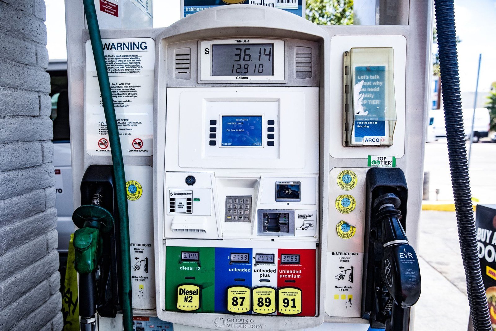 Diesel fuel pump nozzle close-up: why are diesel prices so high right now at record US levels