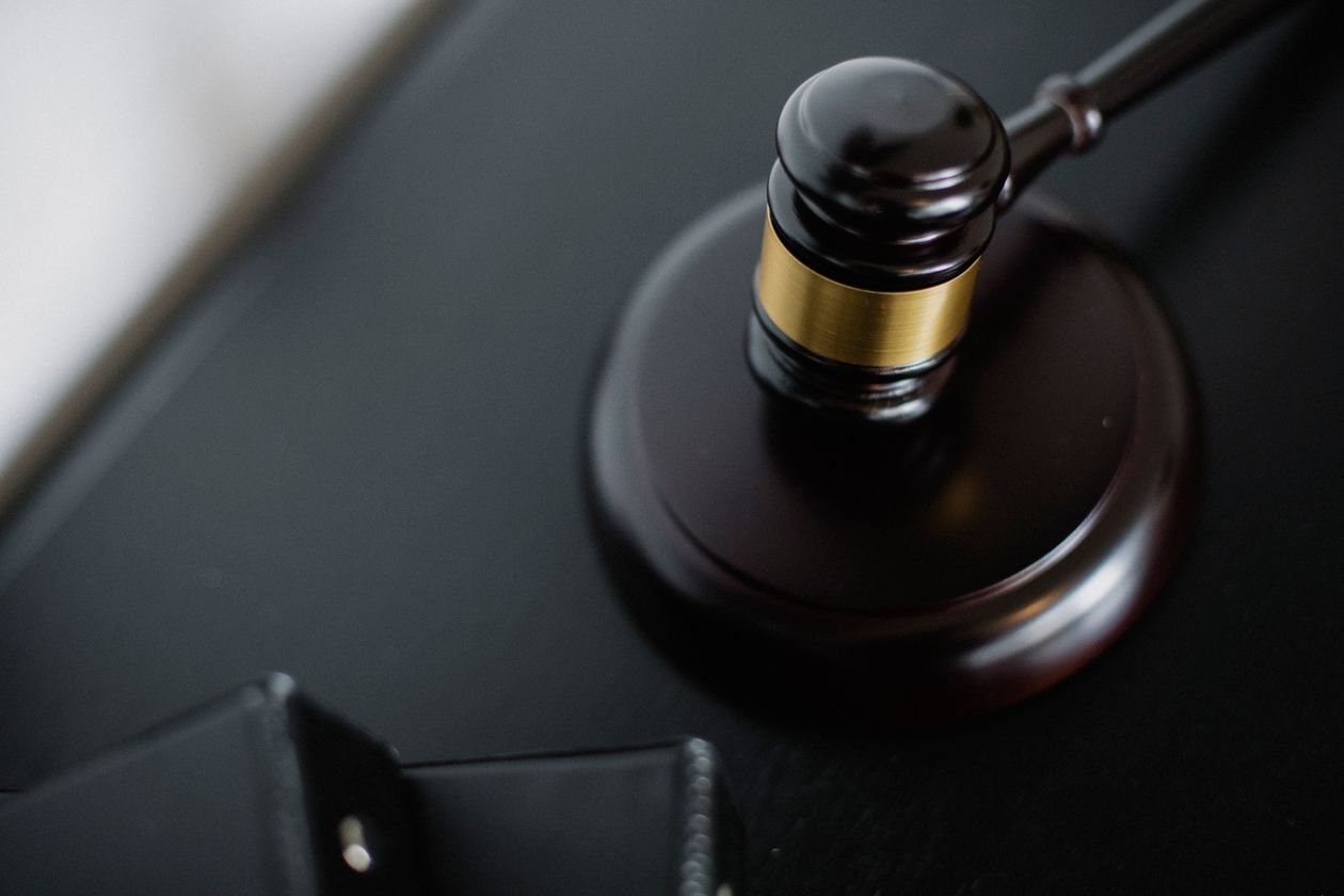 Judge's gavel on a black desk, symbolizing international law and the Nobel Peace Prize 2026