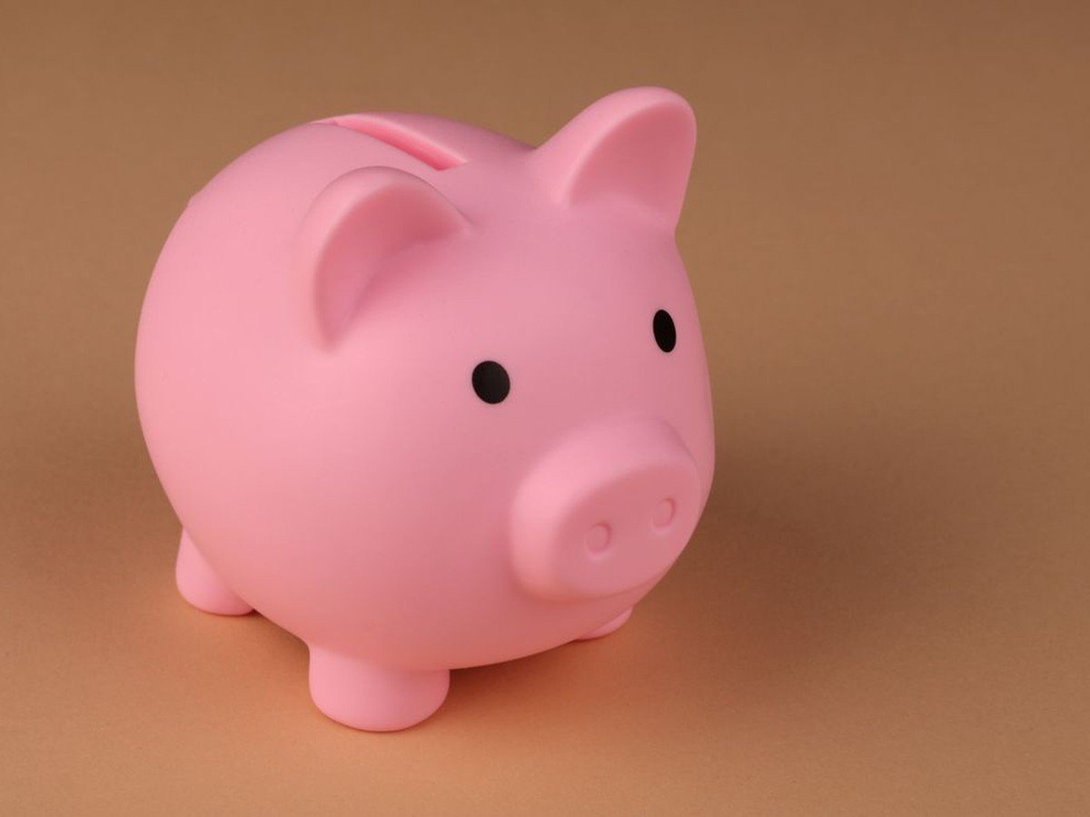 Pink piggy bank symbolizing daily savings habits