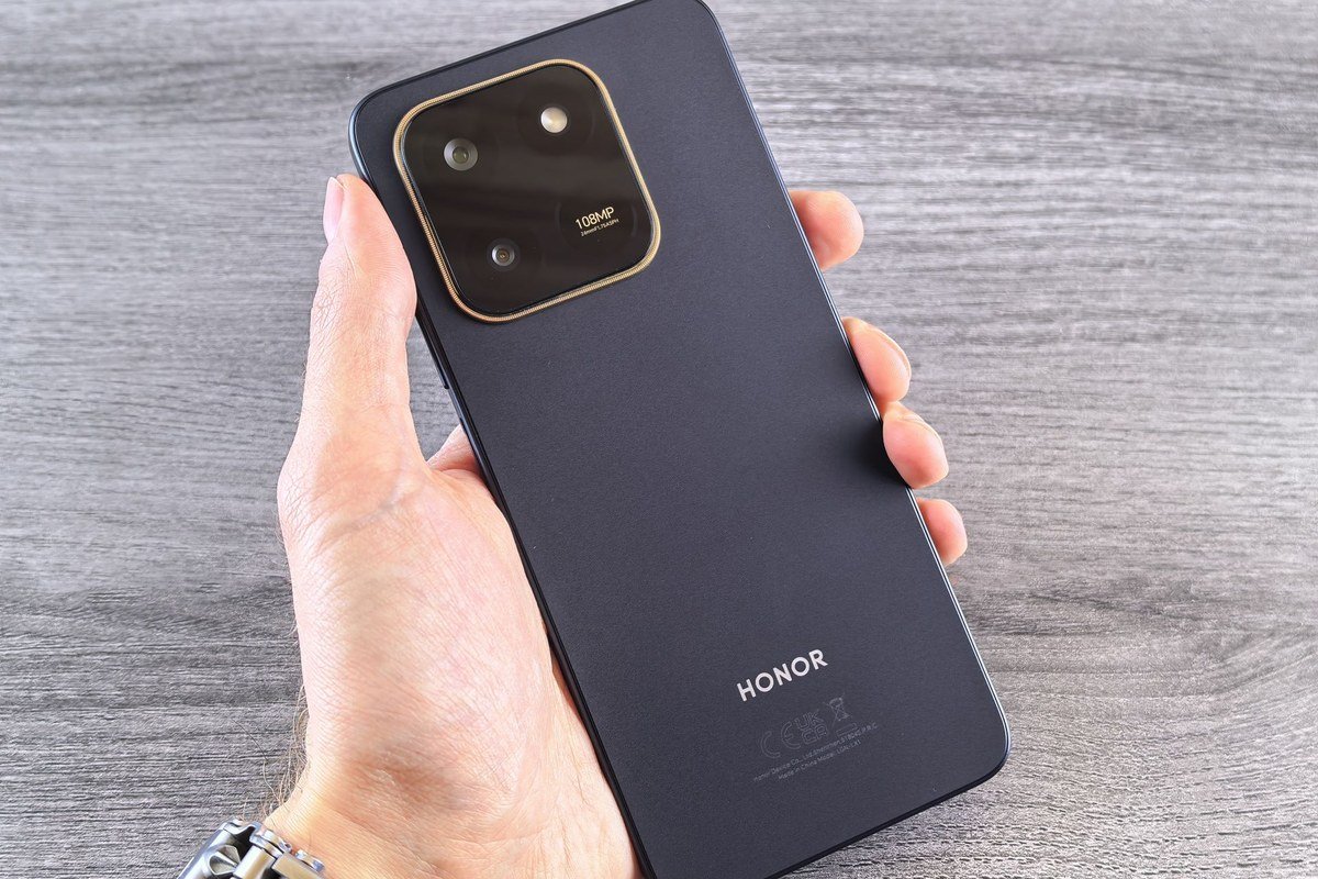 Smartphone in hand — block and report spam texts on any phone