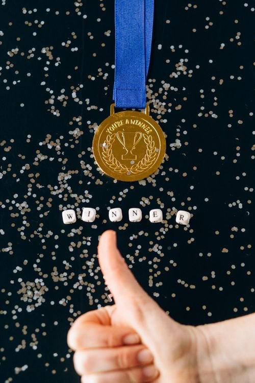 Gold winner's medal with blue ribbon celebrating the Nobel Peace Prize 2026
