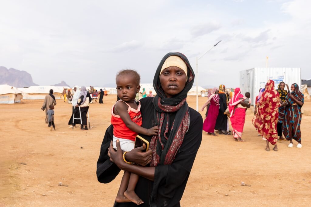 Sudanese mother and child at a displacement camp — Sudan's Emergency Response Rooms lead the 2026 Nobel Peace Prize odds